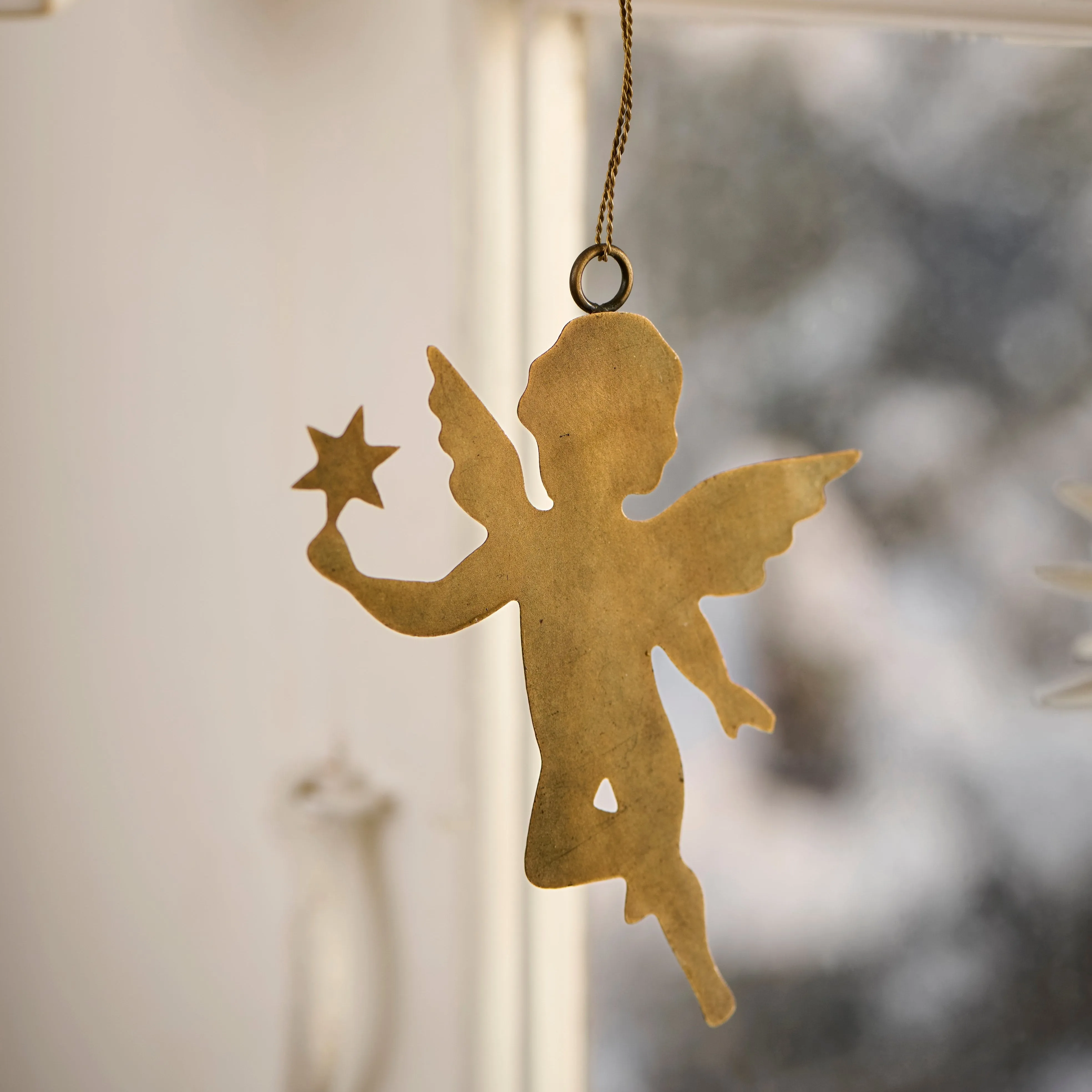 Six Assorted Hanging Brass Angel Decorations